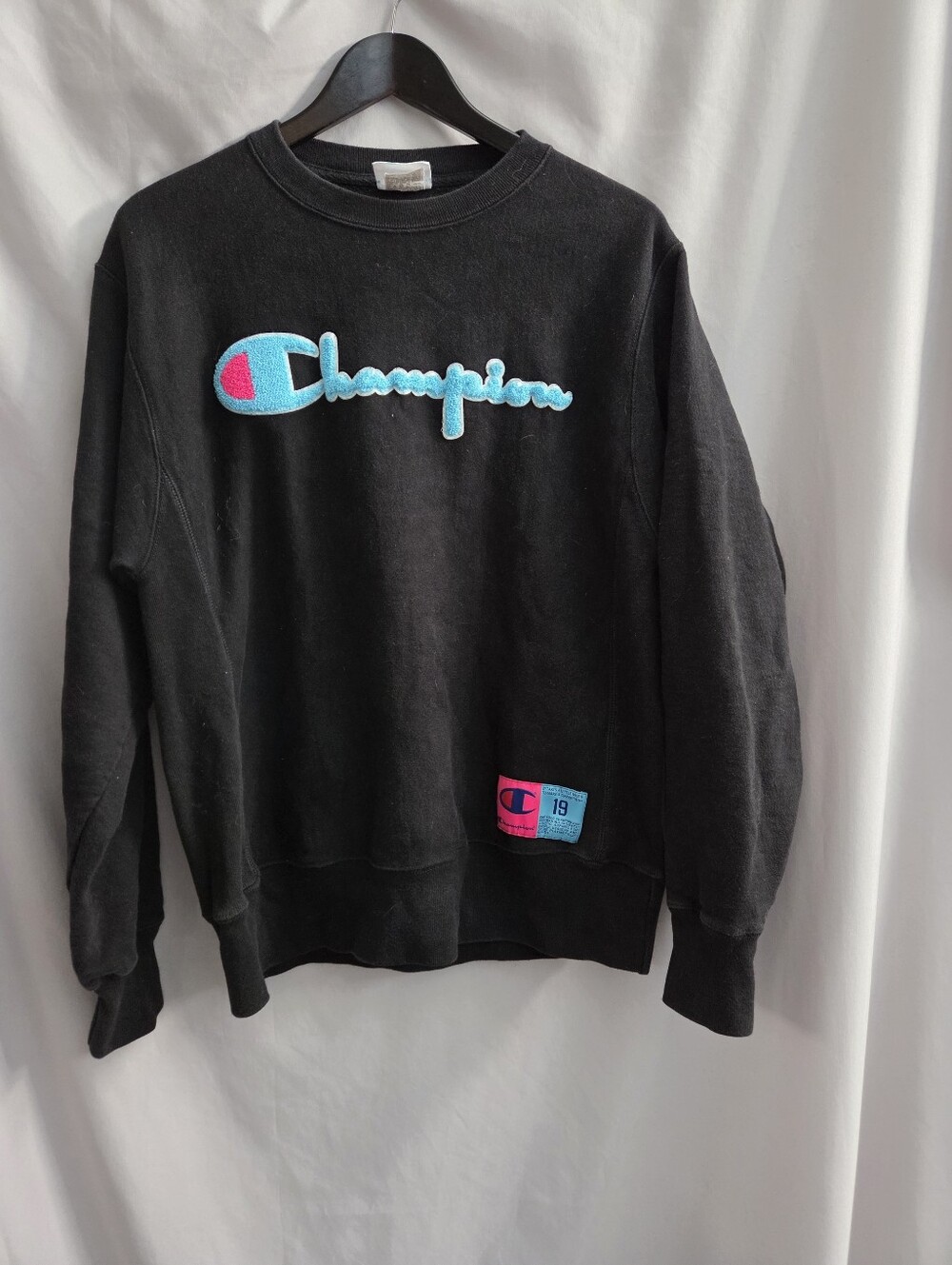 Champion Black Crewneck with Turquoise and Pink Logo Patch